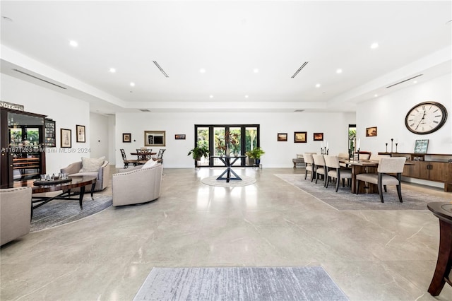 living room with a raised ceiling