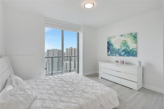 bedroom featuring light hardwood / wood-style floors