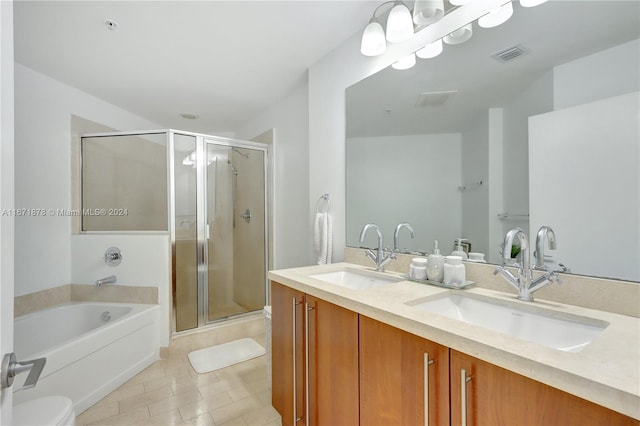 full bathroom featuring vanity, toilet, tile patterned flooring, and plus walk in shower