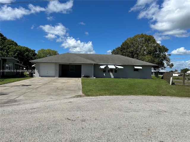 ranch-style house featuring a front lawn