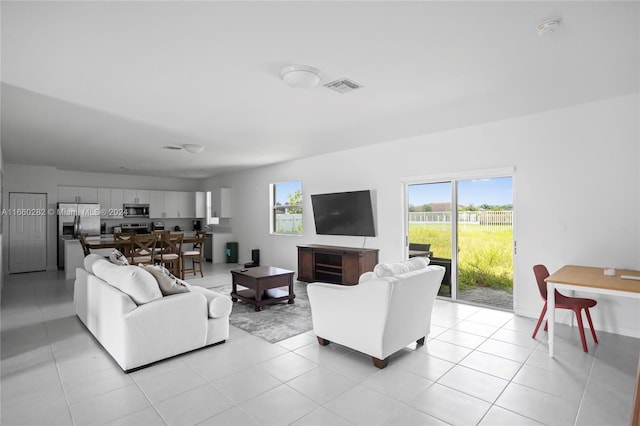 living room with light tile patterned floors