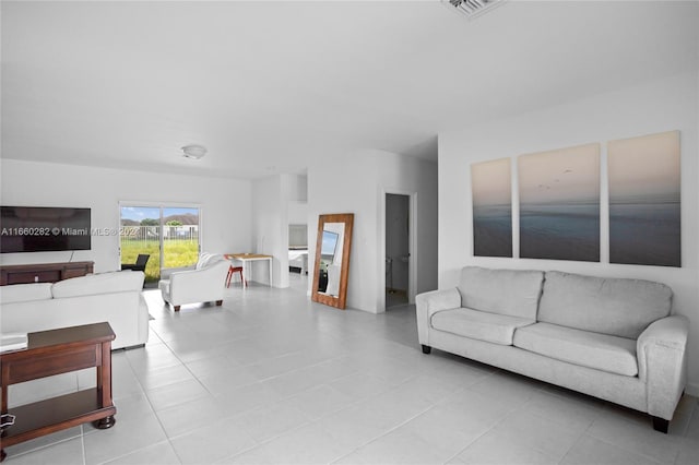 living room with light tile patterned floors