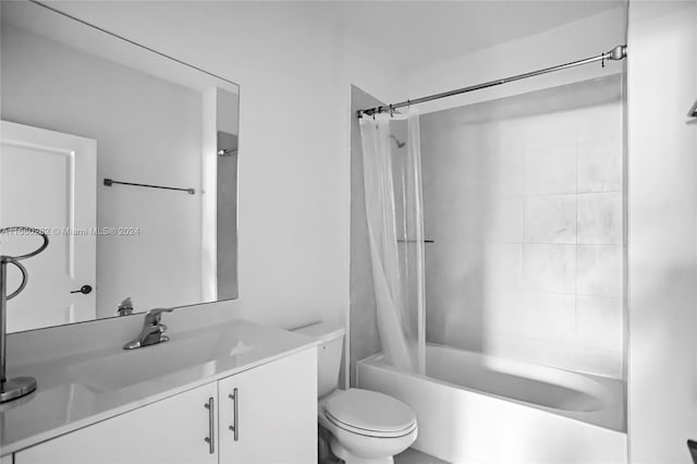 full bathroom featuring vanity, toilet, and shower / bathtub combination with curtain