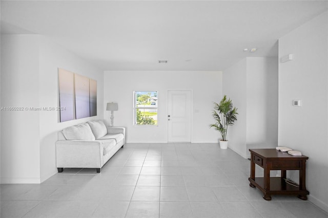 living room with light tile patterned floors