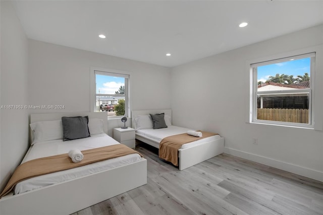 bedroom featuring light wood-type flooring