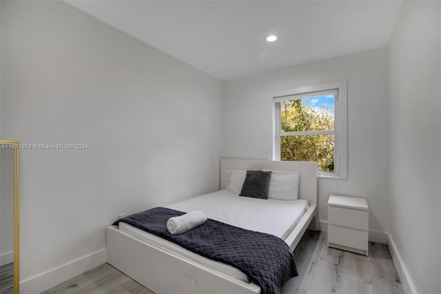 bedroom featuring light hardwood / wood-style flooring