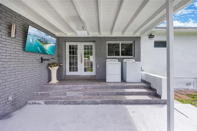 entrance to property with washer and dryer