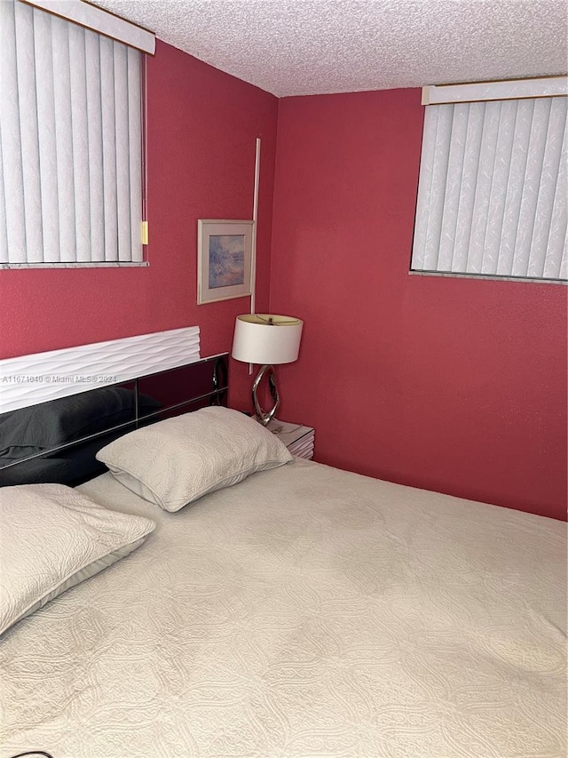 bedroom with a textured ceiling