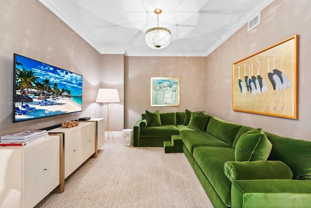 carpeted living room with a chandelier and ornamental molding