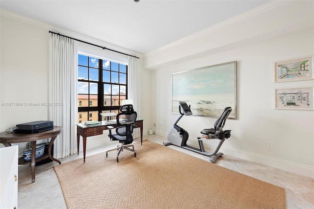 office with crown molding and baseboards