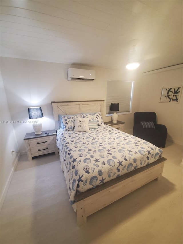 bedroom featuring a wall mounted air conditioner