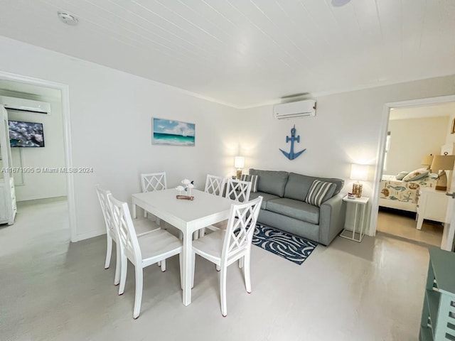 dining space featuring a wall unit AC