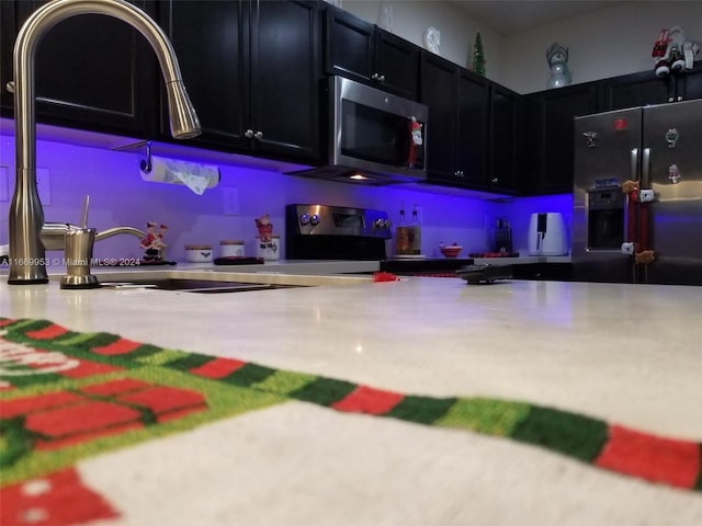 kitchen with appliances with stainless steel finishes and sink