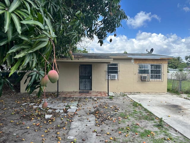 rear view of house featuring a patio area