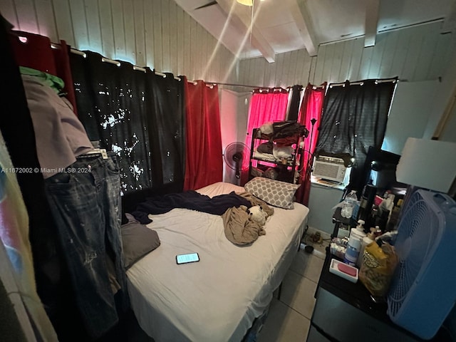 bedroom featuring cooling unit and beam ceiling