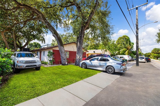 exterior space with a yard