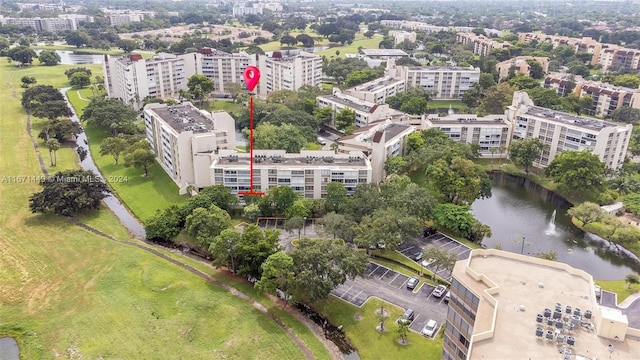 bird's eye view with a water view