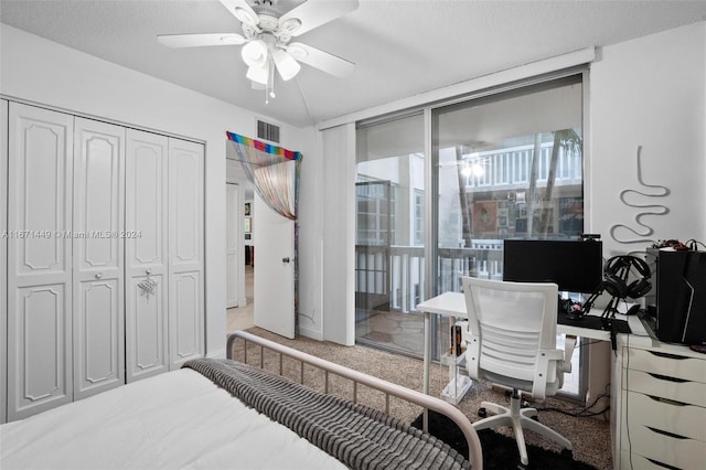 bedroom featuring access to exterior, carpet floors, a closet, and ceiling fan