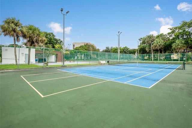 view of tennis court with basketball court