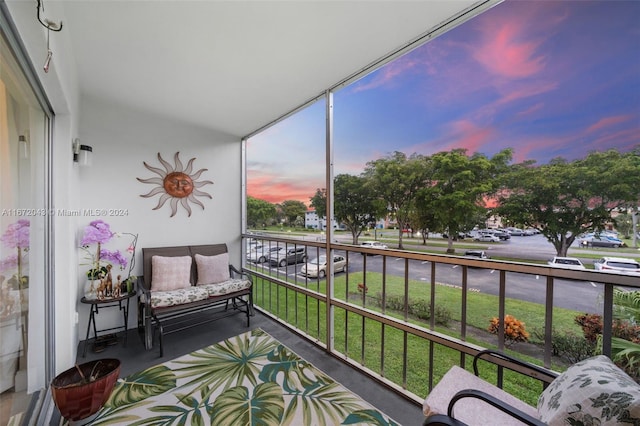 view of balcony at dusk