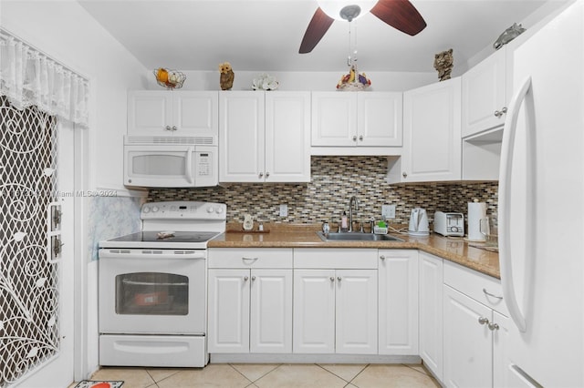 kitchen with white cabinetry, white appliances, light tile patterned floors, ceiling fan, and sink