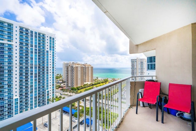 balcony featuring a water view