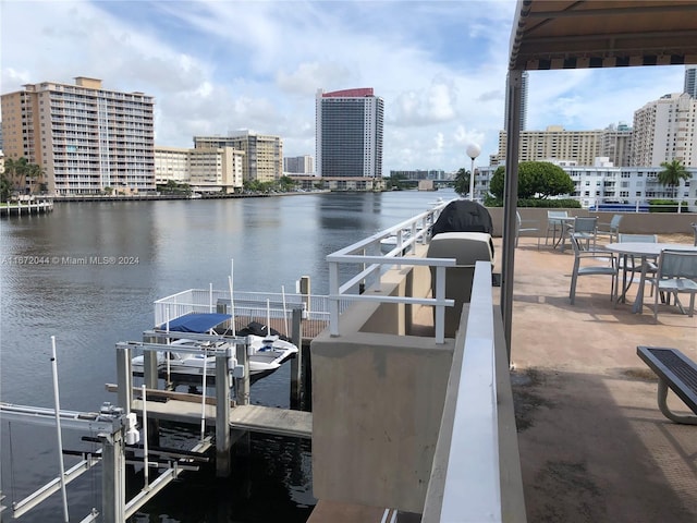 view of dock with a water view