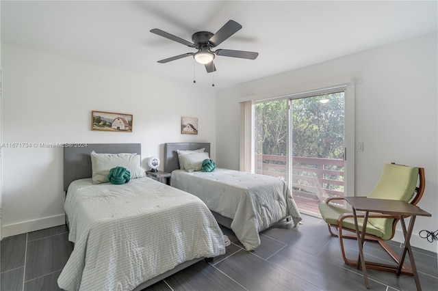 bedroom featuring ceiling fan and dark hardwood / wood-style floors