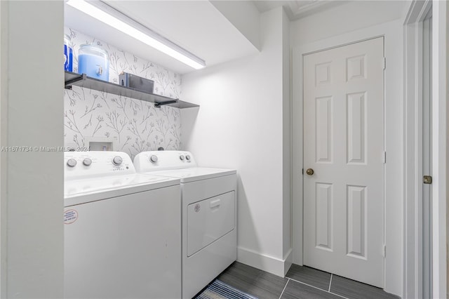 washroom featuring washer and clothes dryer