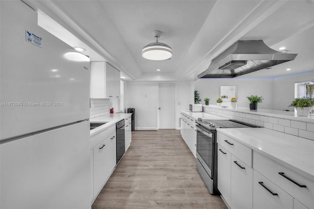 2827 Arthur St, Hollywood, FL 33020 - kitchen with freestanding refrigerator, stainless steel electric range, ventilation hood, dishwasher, and white cabinetry