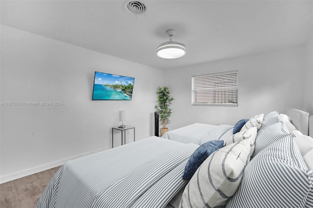 2827 Arthur St, Hollywood, FL 33020 - bedroom featuring wood finished floors and baseboards