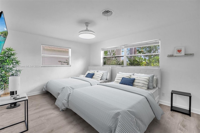 bedroom featuring light hardwood / wood-style floors