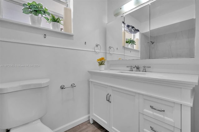 2827 Arthur St, Hollywood, FL 33020 - full bathroom with vanity, healthy amount of natural light, wood finished floors, and a shower