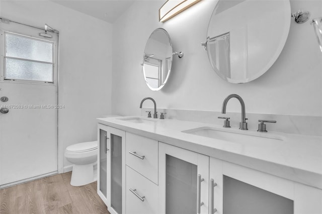 2827 Arthur St, Hollywood, FL 33020 - bathroom with double vanity and wood finished floors