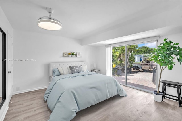 2827 Arthur St, Hollywood, FL 33020 - bedroom with access to outside and wood finished floors