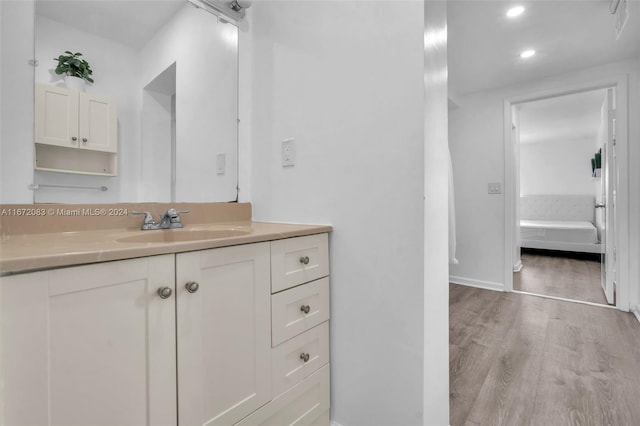 2827 Arthur St, Hollywood, FL 33020 - bathroom featuring wood finished floors, vanity, and recessed lighting