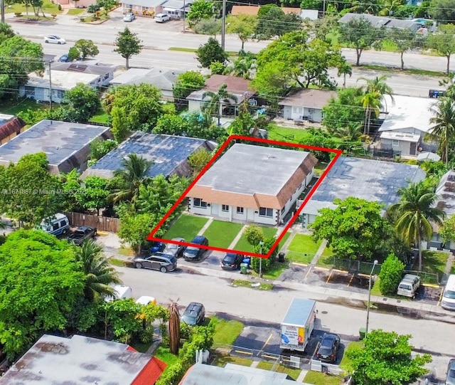 birds eye view of property with a residential view