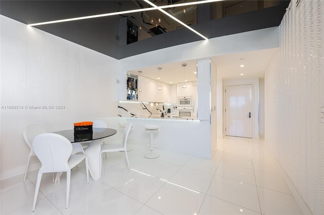 17121 Collins Ave Unit 1103, Sunny Isles Beach, FL 33160 - dining room with tile patterned flooring