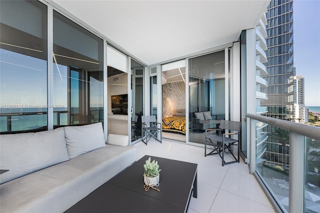 balcony featuring a water view