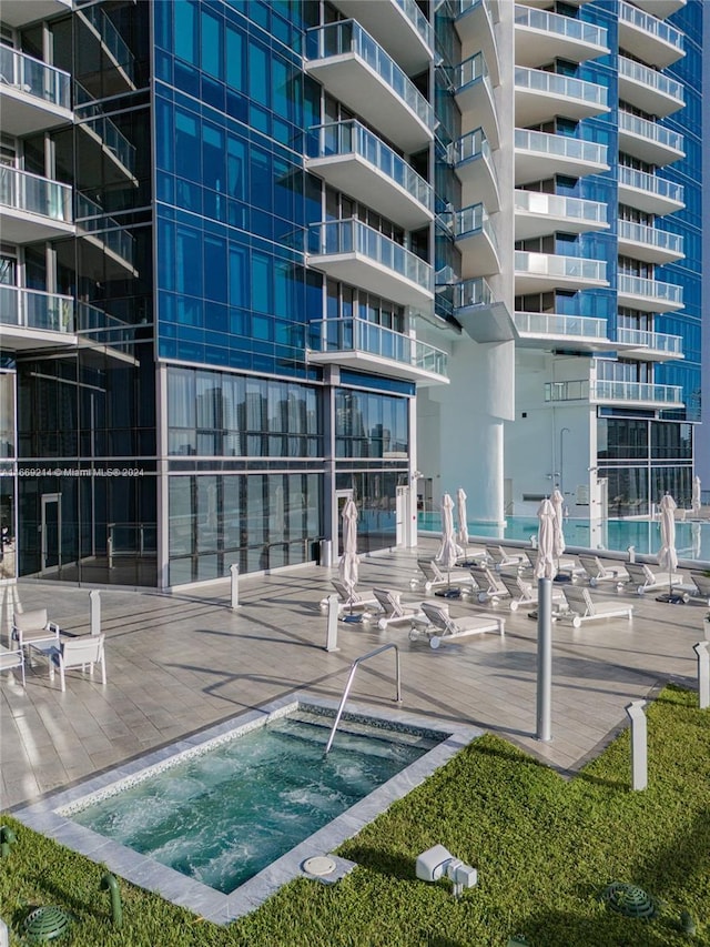 17121 Collins Ave Unit 1103, Sunny Isles Beach, FL 33160 - view of pool with a community hot tub