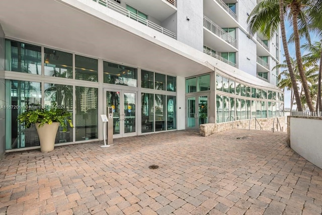 exterior space featuring a balcony and a patio area