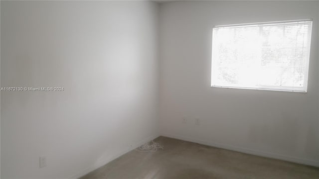 empty room featuring carpet flooring