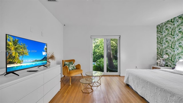 bedroom with light hardwood / wood-style flooring