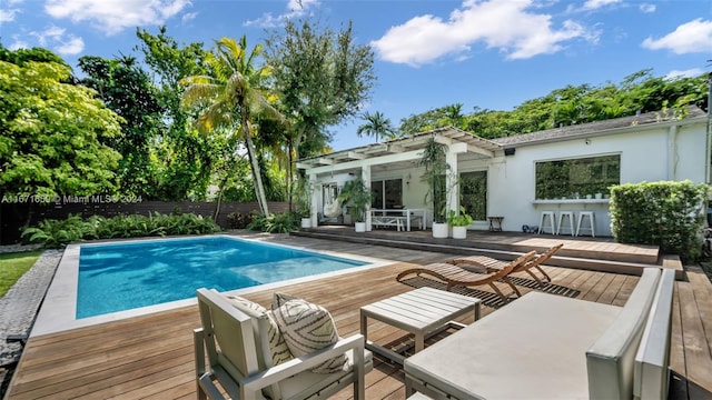 view of pool with a deck