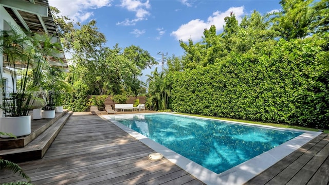 view of pool with a deck