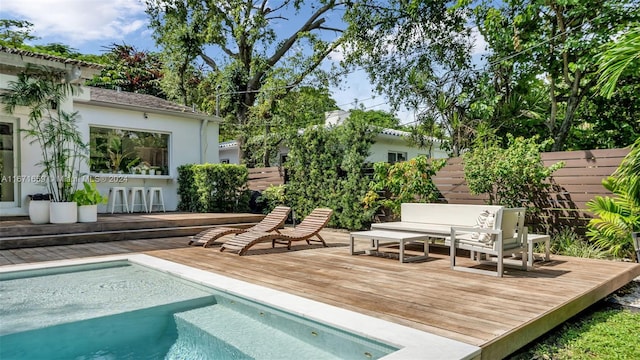 view of pool featuring a wooden deck