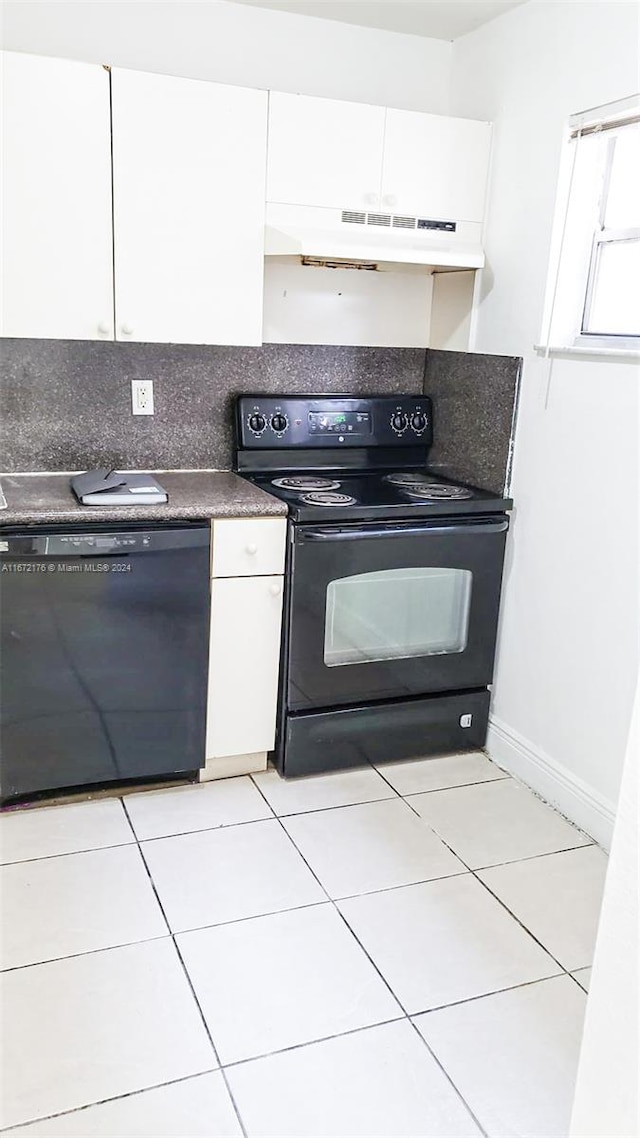 kitchen featuring black appliances, white cabinetry, backsplash, and light tile patterned floors