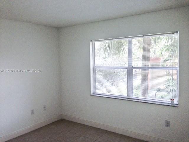 unfurnished room with a wealth of natural light