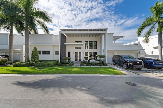 view of front of property with a garage