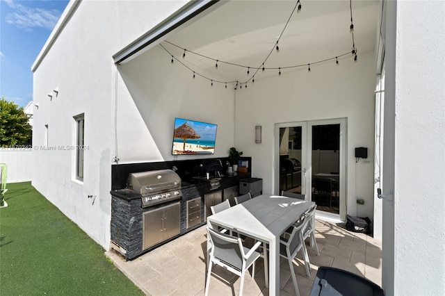 view of patio featuring area for grilling and an outdoor kitchen